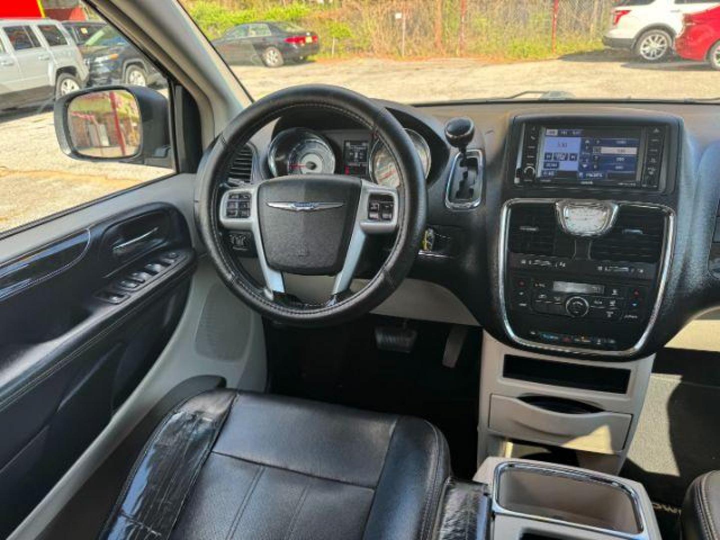 2012 Black Chrysler Town and Country Touring (2C4RC1BG3CR) with an 3.6L V6 DOHC 24V engine, 6-Speed Automatic transmission, located at 1806 Veterans Memorial Hwy SW, Austell, GA, 30168, (770) 944-9558, 33.817959, -84.606987 - Photo#10