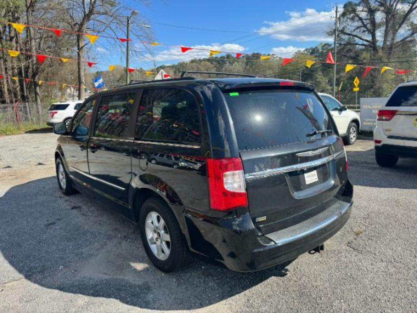 2012 Black Chrysler Town and Country Touring (2C4RC1BG3CR) with an 3.6L V6 DOHC 24V engine, 6-Speed Automatic transmission, located at 1806 Veterans Memorial Hwy SW, Austell, GA, 30168, (770) 944-9558, 33.817959, -84.606987 - Photo#3