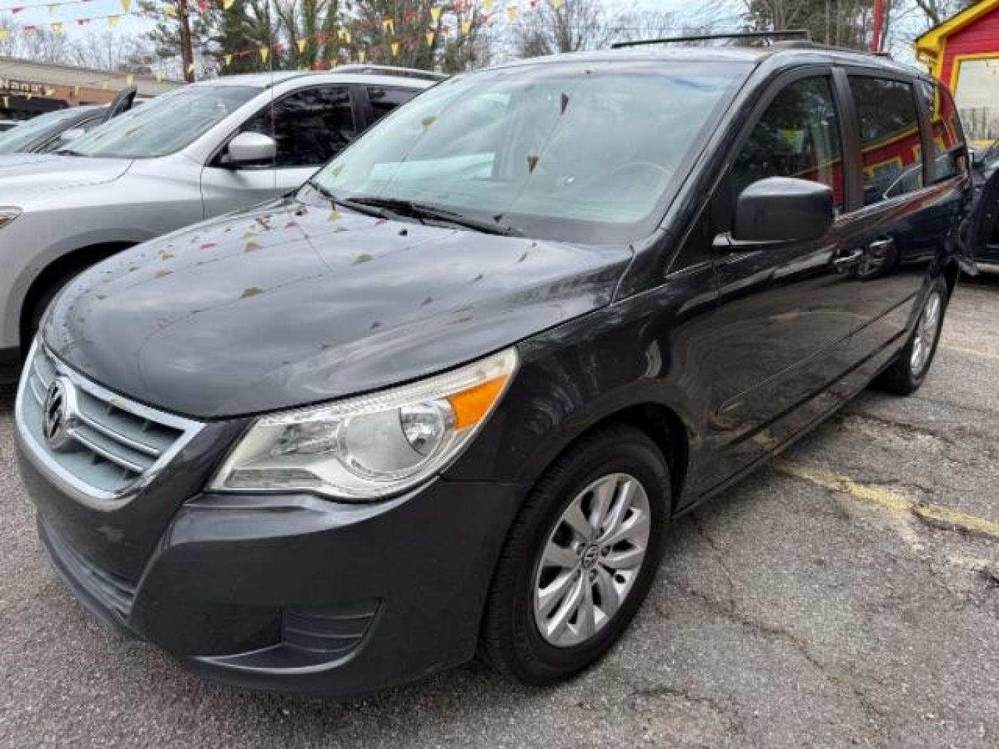 2012 GRAY Volkswagen Routan SE (2C4RVABG8CR) with an 3.6L V6 DOHC 24V engine, 6-Speed Automatic transmission, located at 1806 Veterans Memorial Hwy SW, Austell, GA, 30168, (770) 944-9558, 33.817959, -84.606987 - Photo#0