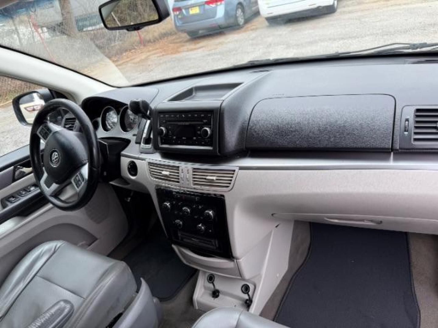 2012 GRAY Volkswagen Routan SE (2C4RVABG8CR) with an 3.6L V6 DOHC 24V engine, 6-Speed Automatic transmission, located at 1806 Veterans Memorial Hwy SW, Austell, GA, 30168, (770) 944-9558, 33.817959, -84.606987 - Photo#22