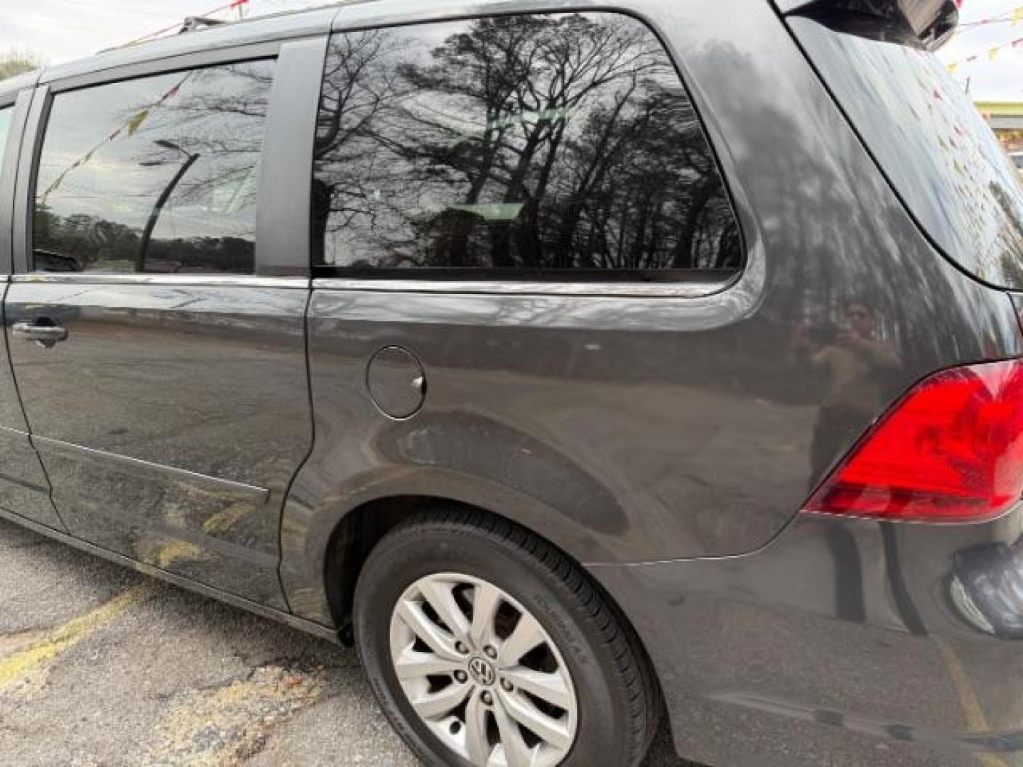 2012 GRAY Volkswagen Routan SE (2C4RVABG8CR) with an 3.6L V6 DOHC 24V engine, 6-Speed Automatic transmission, located at 1806 Veterans Memorial Hwy SW, Austell, GA, 30168, (770) 944-9558, 33.817959, -84.606987 - Photo#2