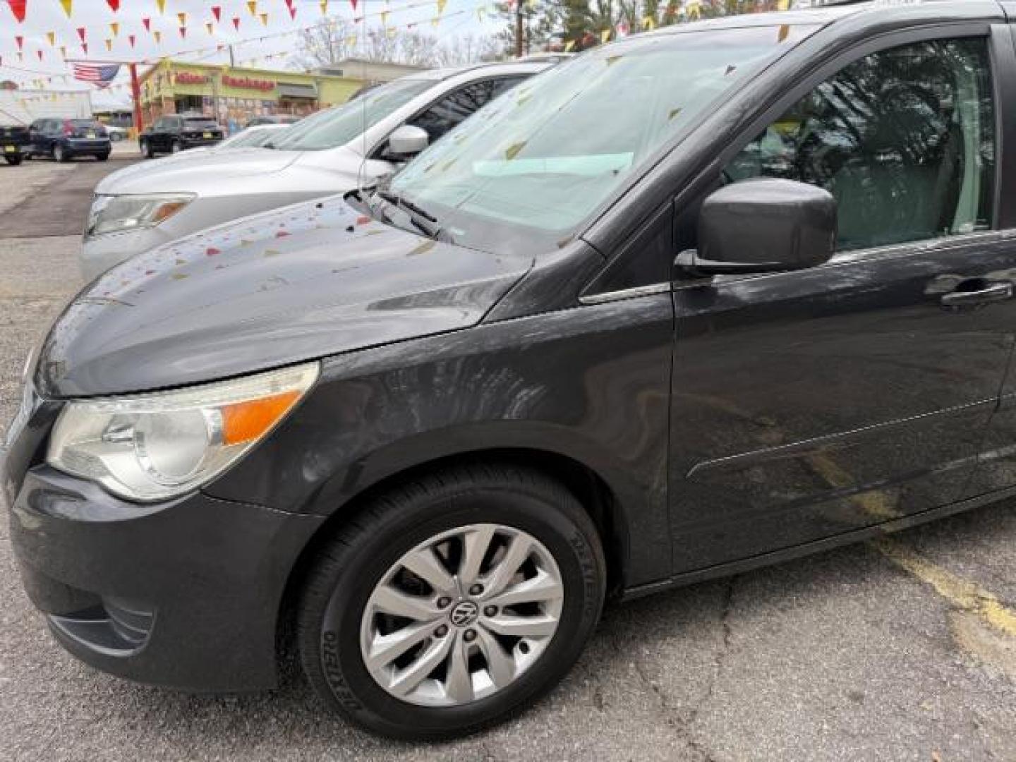 2012 GRAY Volkswagen Routan SE (2C4RVABG8CR) with an 3.6L V6 DOHC 24V engine, 6-Speed Automatic transmission, located at 1806 Veterans Memorial Hwy SW, Austell, GA, 30168, (770) 944-9558, 33.817959, -84.606987 - Photo#4