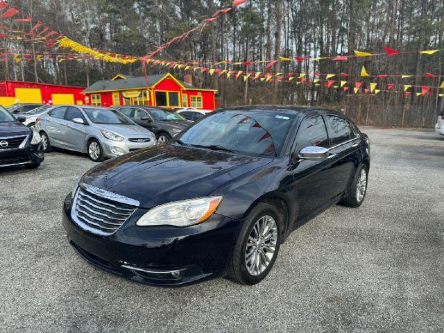 2012 Blue Chrysler 200 Limited (1C3CCBCB4CN) with an 2.4L L4 DOHC 16V engine, 6-Speed Automatic transmission, located at 1806 Veterans Memorial Hwy SW, Austell, GA, 30168, (770) 944-9558, 33.817959, -84.606987 - Photo#0