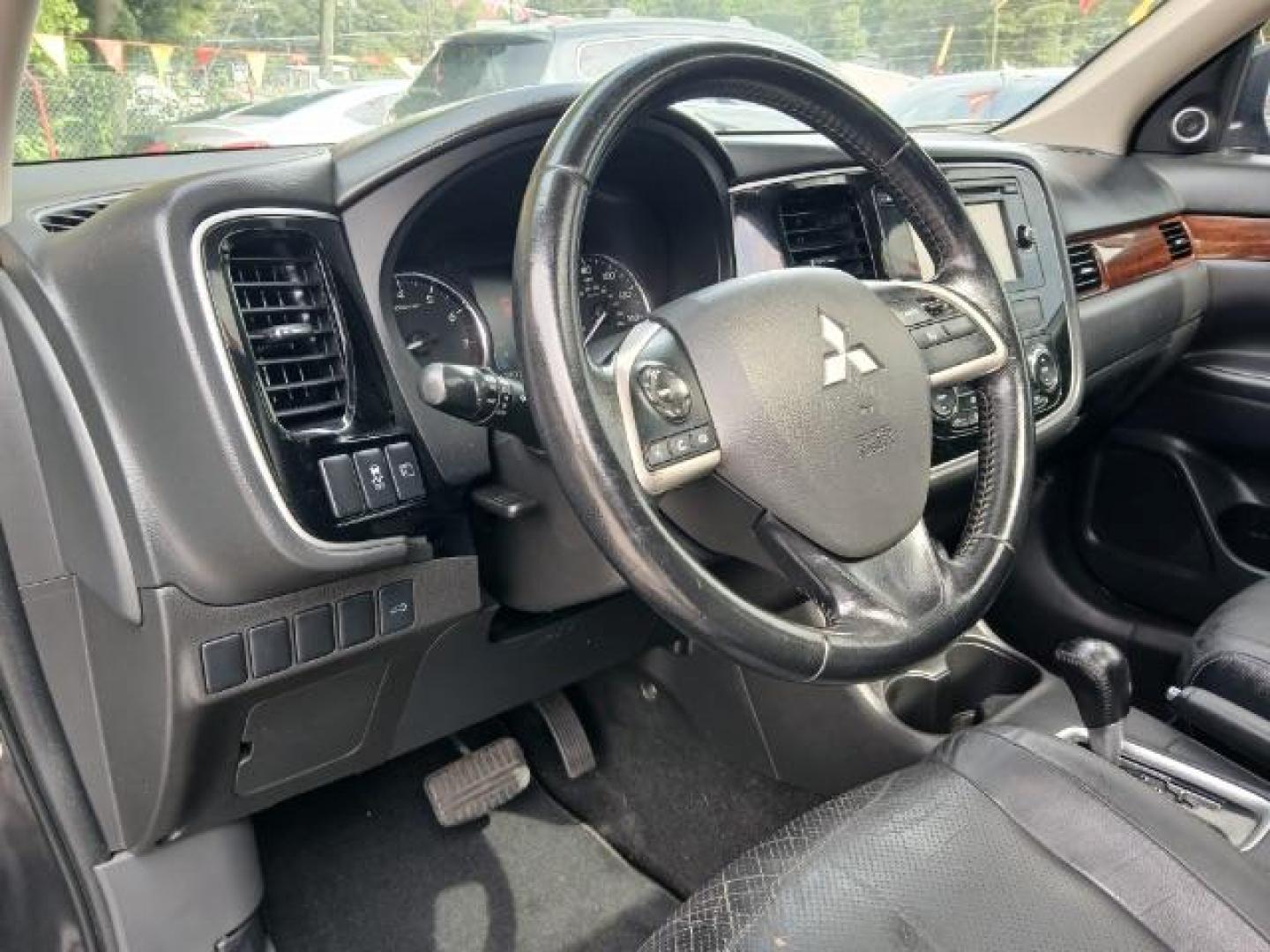 2014 BLACK Mitsubishi Outlander SPORT UTILITY 4-DR (JA4AD3A36EZ) with an 2.4L L4 DOHC 16V engine, 6-Speed Automatic transmission, located at 1806 Veterans Memorial Hwy SW, Austell, GA, 30168, (770) 944-9558, 33.817959, -84.606987 - Photo#19