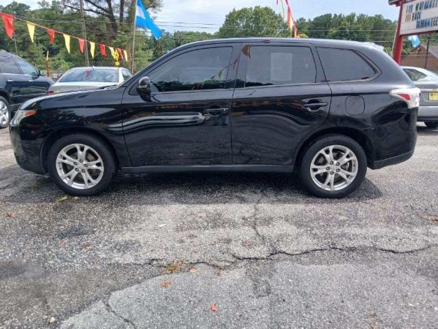 2014 BLACK Mitsubishi Outlander SPORT UTILITY 4-DR (JA4AD3A36EZ) with an 2.4L L4 DOHC 16V engine, 6-Speed Automatic transmission, located at 1806 Veterans Memorial Hwy SW, Austell, GA, 30168, (770) 944-9558, 33.817959, -84.606987 - Photo#6