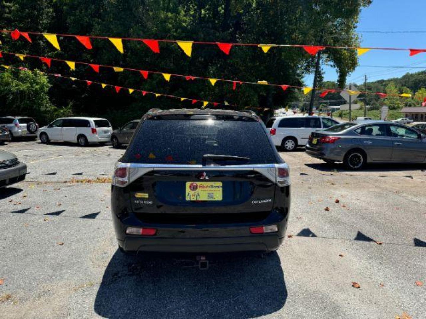 2016 Black Mitsubishi Outlander SEL 2WD (JA4AD3A31GZ) with an 2.4L L4 DOHC 16V engine, Continuously Variabl transmission, located at 1806 Veterans Memorial Hwy SW, Austell, GA, 30168, (770) 944-9558, 33.817959, -84.606987 - Photo#4