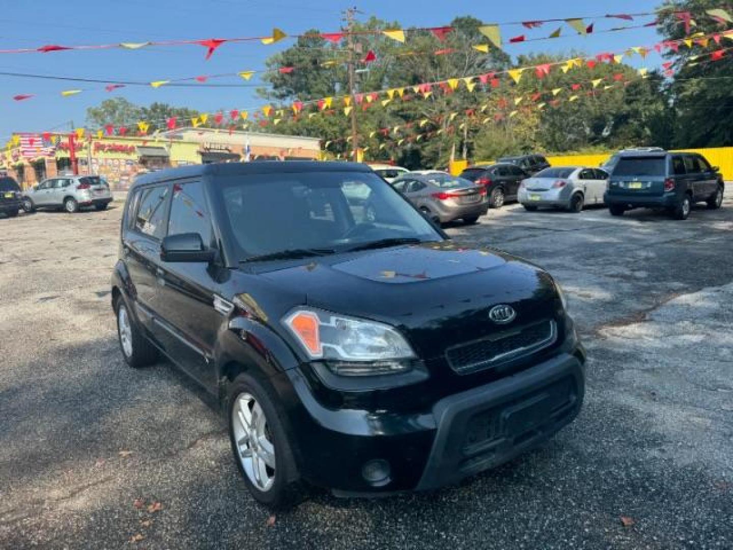 2010 Black Kia Soul + (KNDJT2A27A7) with an 2.0L L4 DOHC 16V engine, 4-Speed Automatic transmission, located at 1806 Veterans Memorial Hwy SW, Austell, GA, 30168, (770) 944-9558, 33.817959, -84.606987 - Photo#2