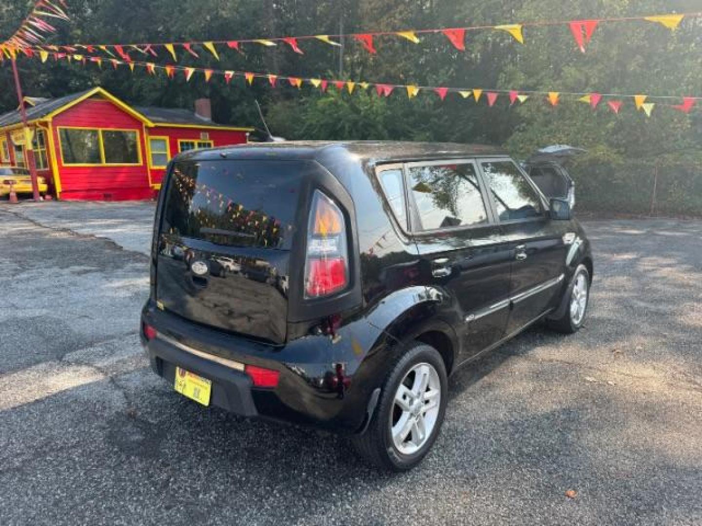 2010 Black Kia Soul + (KNDJT2A27A7) with an 2.0L L4 DOHC 16V engine, 4-Speed Automatic transmission, located at 1806 Veterans Memorial Hwy SW, Austell, GA, 30168, (770) 944-9558, 33.817959, -84.606987 - Photo#3