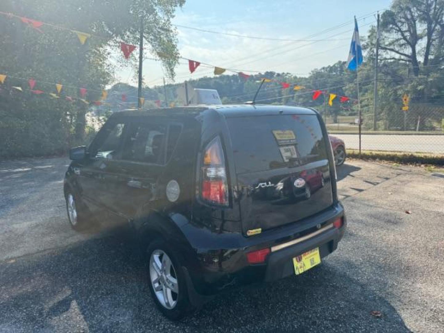 2010 Black Kia Soul + (KNDJT2A27A7) with an 2.0L L4 DOHC 16V engine, 4-Speed Automatic transmission, located at 1806 Veterans Memorial Hwy SW, Austell, GA, 30168, (770) 944-9558, 33.817959, -84.606987 - Photo#4