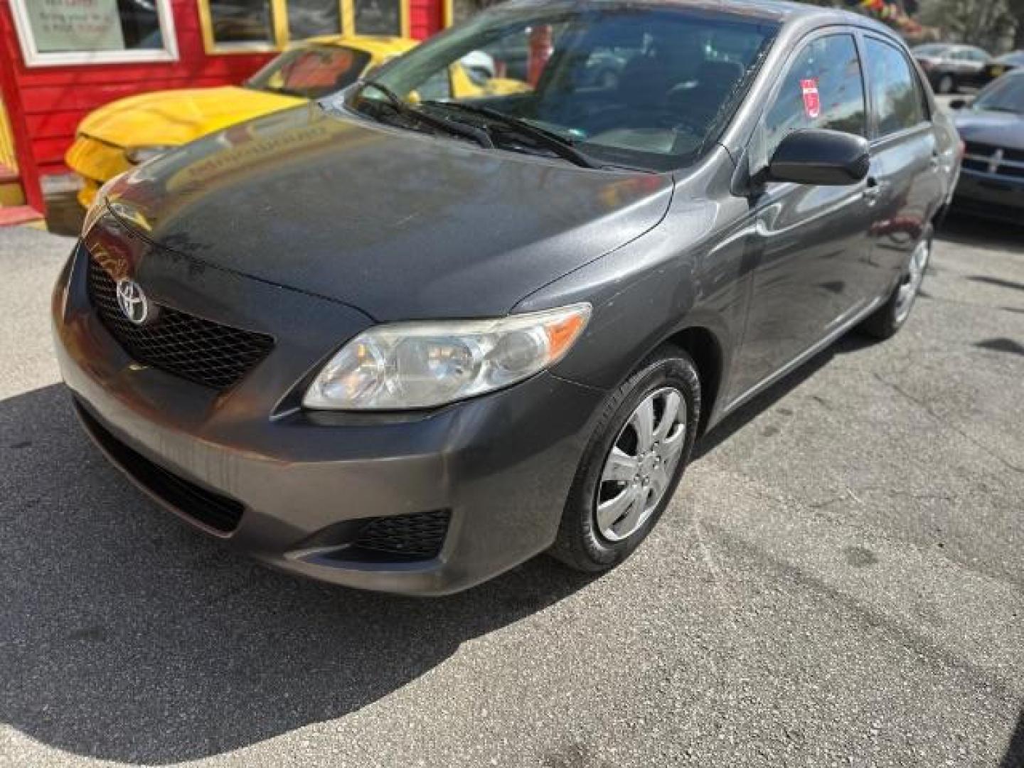 2009 Gray Toyota Corolla LE 4-Speed AT (JTDBL40E39J) with an 1.8L L4 DOHC 16V engine, 4-Speed Automatic transmission, located at 1806 Veterans Memorial Hwy SW, Austell, GA, 30168, (770) 944-9558, 33.817959, -84.606987 - Photo#0