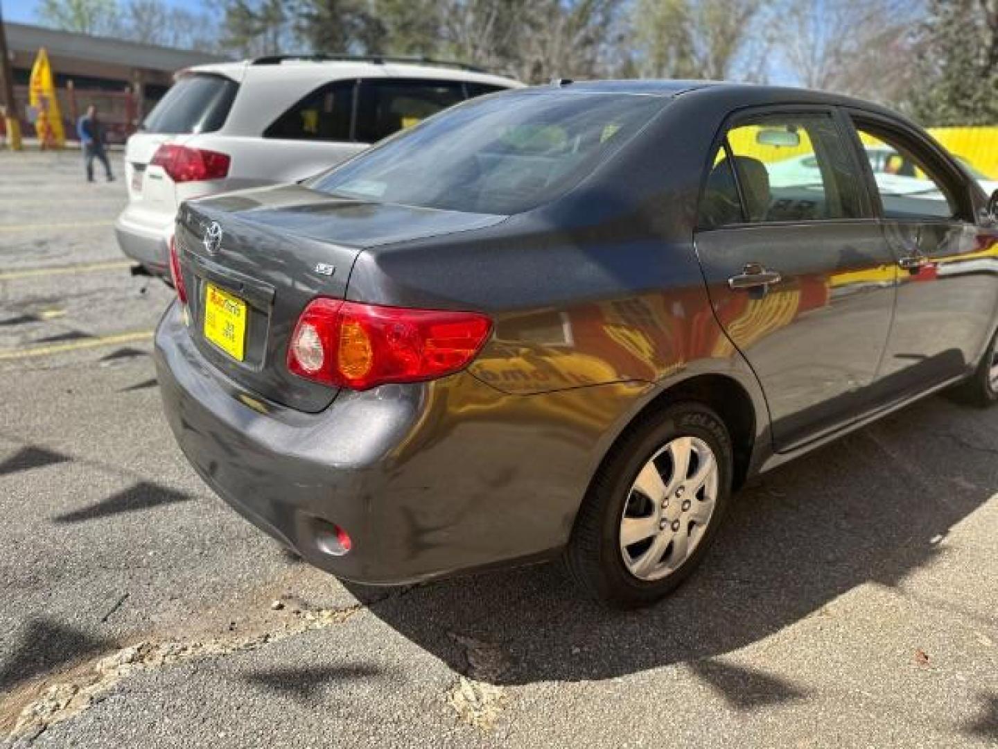 2009 Gray Toyota Corolla LE 4-Speed AT (JTDBL40E39J) with an 1.8L L4 DOHC 16V engine, 4-Speed Automatic transmission, located at 1806 Veterans Memorial Hwy SW, Austell, GA, 30168, (770) 944-9558, 33.817959, -84.606987 - Photo#3