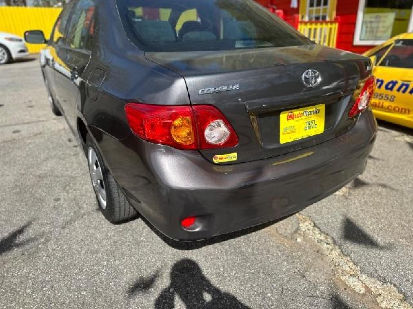 2009 Gray Toyota Corolla LE 4-Speed AT (JTDBL40E39J) with an 1.8L L4 DOHC 16V engine, 4-Speed Automatic transmission, located at 1806 Veterans Memorial Hwy SW, Austell, GA, 30168, (770) 944-9558, 33.817959, -84.606987 - Photo#5