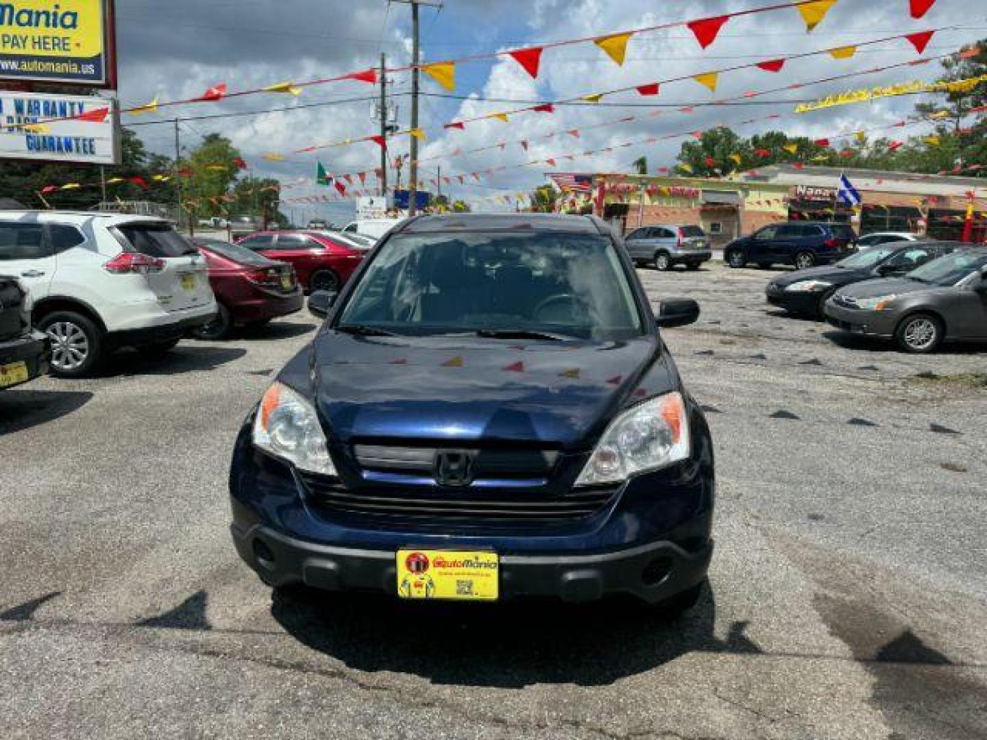 2009 Blue Honda CR-V LX 2WD 5-Speed AT (JHLRE38399C) with an 2.4L L4 DOHC 16V engine, 5-Speed Automatic transmission, located at 1806 Veterans Memorial Hwy SW, Austell, GA, 30168, (770) 944-9558, 33.817959, -84.606987 - Photo#1