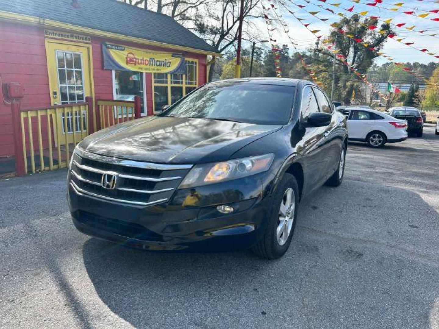 2010 Black Honda Accord Crosstour EX 2WD 5-Spd AT (5J6TF1H3XAL) with an 3.5L V6 SOHC 24V engine, 5-Speed Automatic transmission, located at 1806 Veterans Memorial Hwy SW, Austell, GA, 30168, (770) 944-9558, 33.817959, -84.606987 - Photo#0