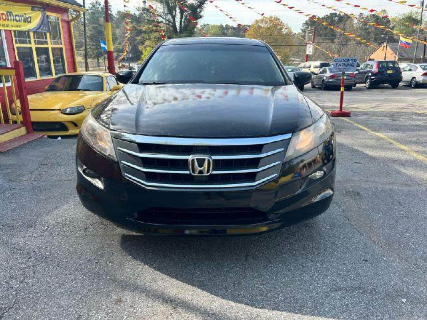 2010 Black Honda Accord Crosstour EX 2WD 5-Spd AT (5J6TF1H3XAL) with an 3.5L V6 SOHC 24V engine, 5-Speed Automatic transmission, located at 1806 Veterans Memorial Hwy SW, Austell, GA, 30168, (770) 944-9558, 33.817959, -84.606987 - Photo#1