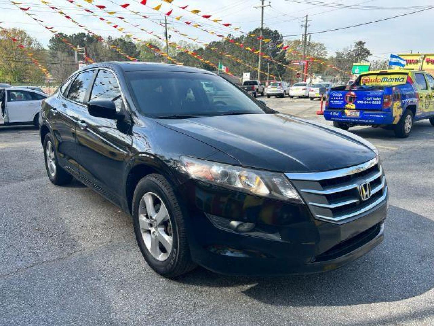 2010 Black Honda Accord Crosstour EX 2WD 5-Spd AT (5J6TF1H3XAL) with an 3.5L V6 SOHC 24V engine, 5-Speed Automatic transmission, located at 1806 Veterans Memorial Hwy SW, Austell, GA, 30168, (770) 944-9558, 33.817959, -84.606987 - Photo#2