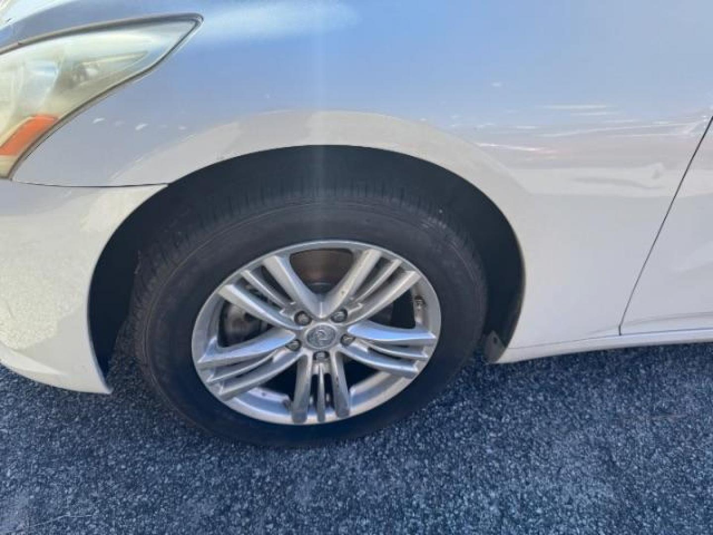 2011 WHITE Infiniti G Sedan G25x AWD (JN1DV6AR5BM) with an 2.5L L4 DOHC 16V engine, 5-Speed Automatic transmission, located at 1806 Veterans Memorial Hwy SW, Austell, GA, 30168, (770) 944-9558, 33.817959, -84.606987 - Photo#14