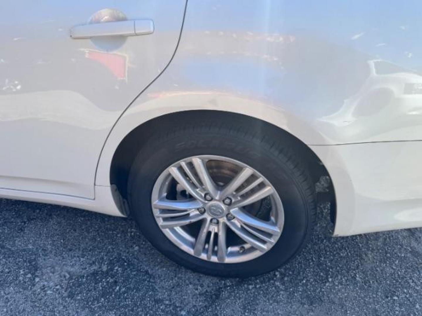 2011 WHITE Infiniti G Sedan G25x AWD (JN1DV6AR5BM) with an 2.5L L4 DOHC 16V engine, 5-Speed Automatic transmission, located at 1806 Veterans Memorial Hwy SW, Austell, GA, 30168, (770) 944-9558, 33.817959, -84.606987 - Photo#17