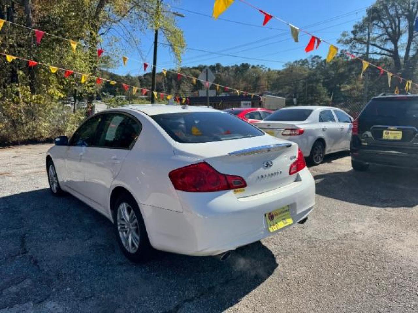 2011 WHITE Infiniti G Sedan G25x AWD (JN1DV6AR5BM) with an 2.5L L4 DOHC 16V engine, 5-Speed Automatic transmission, located at 1806 Veterans Memorial Hwy SW, Austell, GA, 30168, (770) 944-9558, 33.817959, -84.606987 - Photo#1