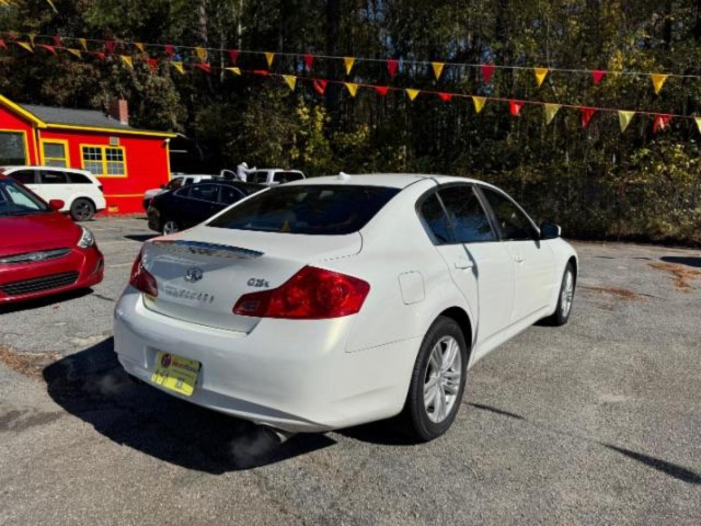 2011 WHITE Infiniti G Sedan G25x AWD (JN1DV6AR5BM) with an 2.5L L4 DOHC 16V engine, 5-Speed Automatic transmission, located at 1806 Veterans Memorial Hwy SW, Austell, GA, 30168, (770) 944-9558, 33.817959, -84.606987 - Photo#2