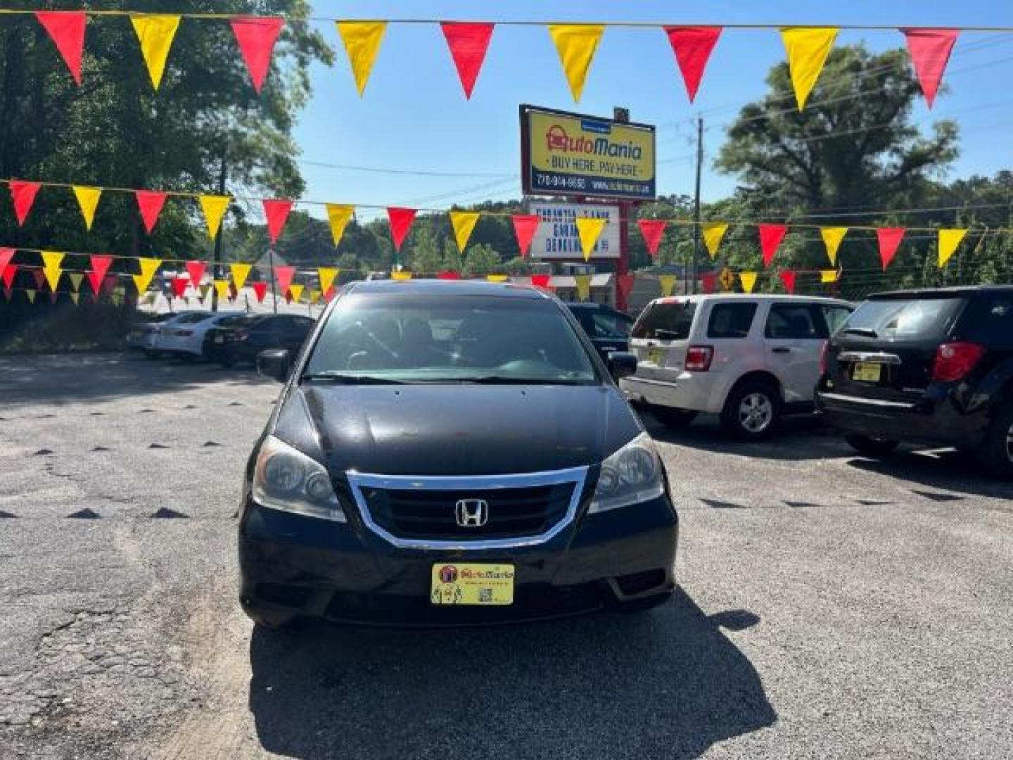 2010 Black Honda Odyssey EX-L w/ DVD (5FNRL3H79AB) with an 3.5L V6 SOHC 24V engine, 5-Speed Automatic transmission, located at 1806 Veterans Memorial Hwy SW, Austell, GA, 30168, (770) 944-9558, 33.817959, -84.606987 - Photo#0