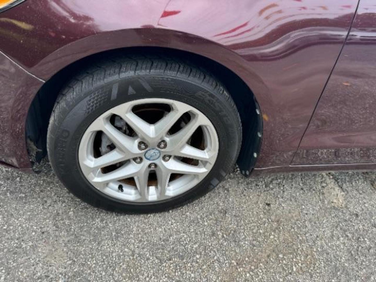 2013 Burgundy Ford Fusion SE (3FA6P0HRXDR) with an 1.6L L4 DOHC 16V engine, 5-Speed Automatic transmission, located at 1806 Veterans Memorial Hwy SW, Austell, GA, 30168, (770) 944-9558, 33.817959, -84.606987 - Photo#18