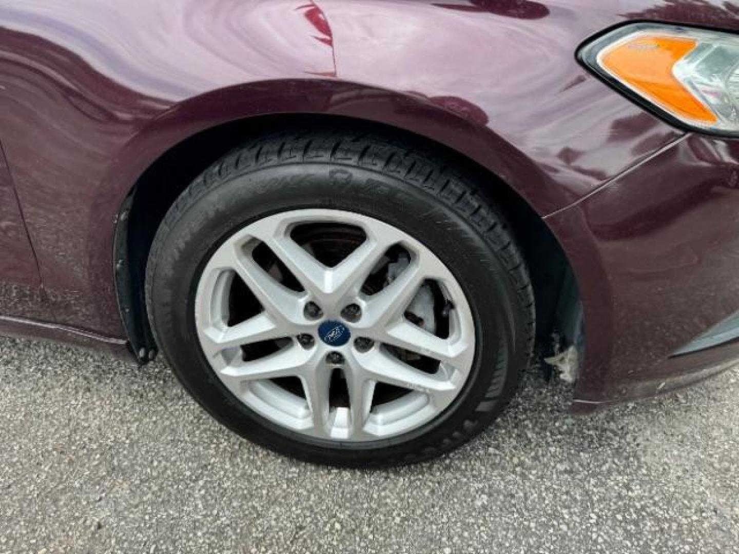 2013 Burgundy Ford Fusion SE (3FA6P0HRXDR) with an 1.6L L4 DOHC 16V engine, 5-Speed Automatic transmission, located at 1806 Veterans Memorial Hwy SW, Austell, GA, 30168, (770) 944-9558, 33.817959, -84.606987 - Photo#19