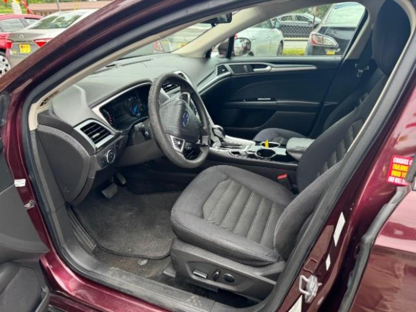 2013 Burgundy Ford Fusion SE (3FA6P0HRXDR) with an 1.6L L4 DOHC 16V engine, 5-Speed Automatic transmission, located at 1806 Veterans Memorial Hwy SW, Austell, GA, 30168, (770) 944-9558, 33.817959, -84.606987 - Photo#5