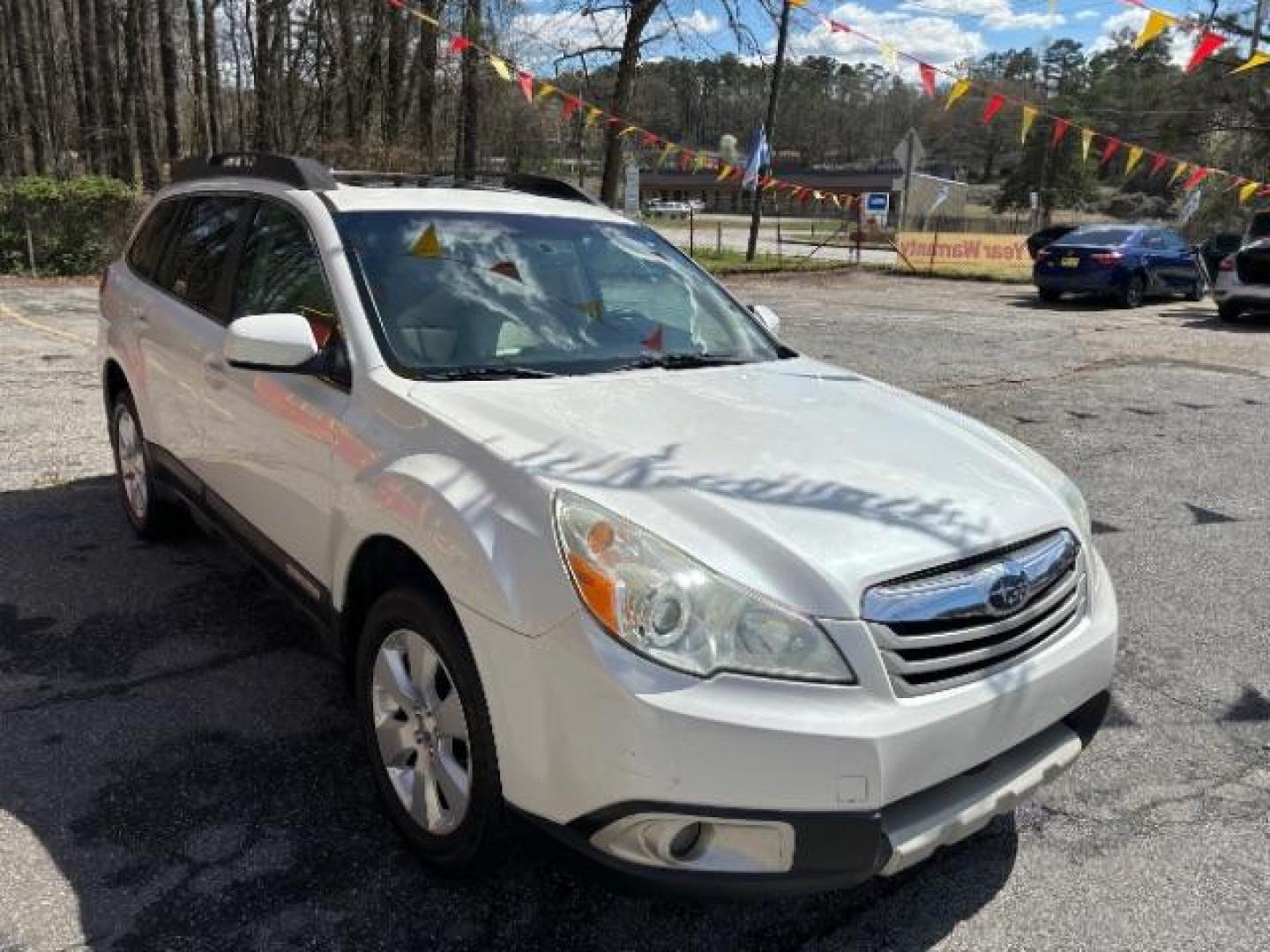 2010 White Subaru Outback 2.5i Limited (4S4BRCKC0A3) with an 2.5L H4 DOHC 16V engine, Continuously Variable Transmission transmission, located at 1806 Veterans Memorial Hwy SW, Austell, GA, 30168, (770) 944-9558, 33.817959, -84.606987 - Photo#0