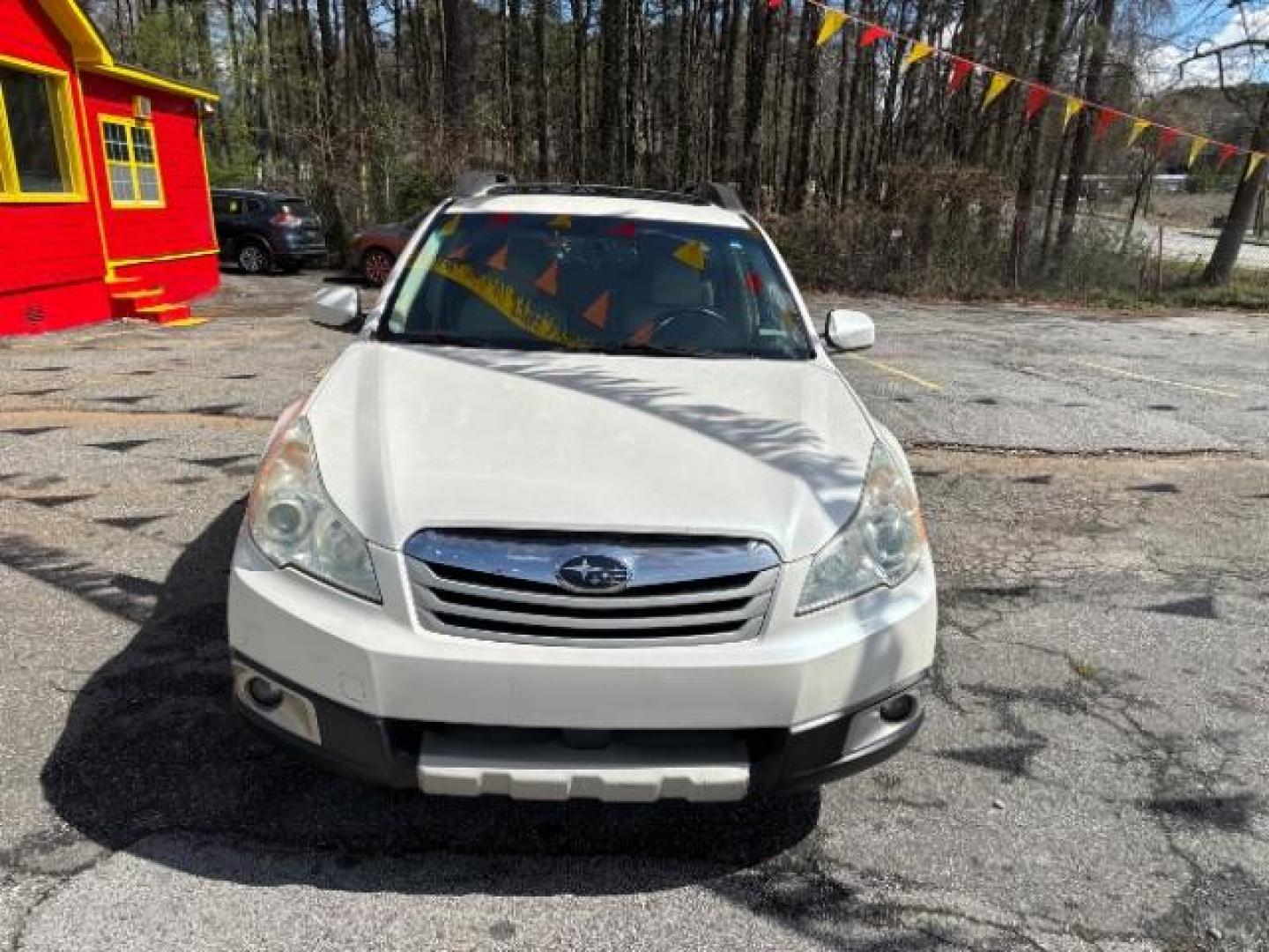 2010 White Subaru Outback 2.5i Limited (4S4BRCKC0A3) with an 2.5L H4 DOHC 16V engine, Continuously Variable Transmission transmission, located at 1806 Veterans Memorial Hwy SW, Austell, GA, 30168, (770) 944-9558, 33.817959, -84.606987 - Photo#1