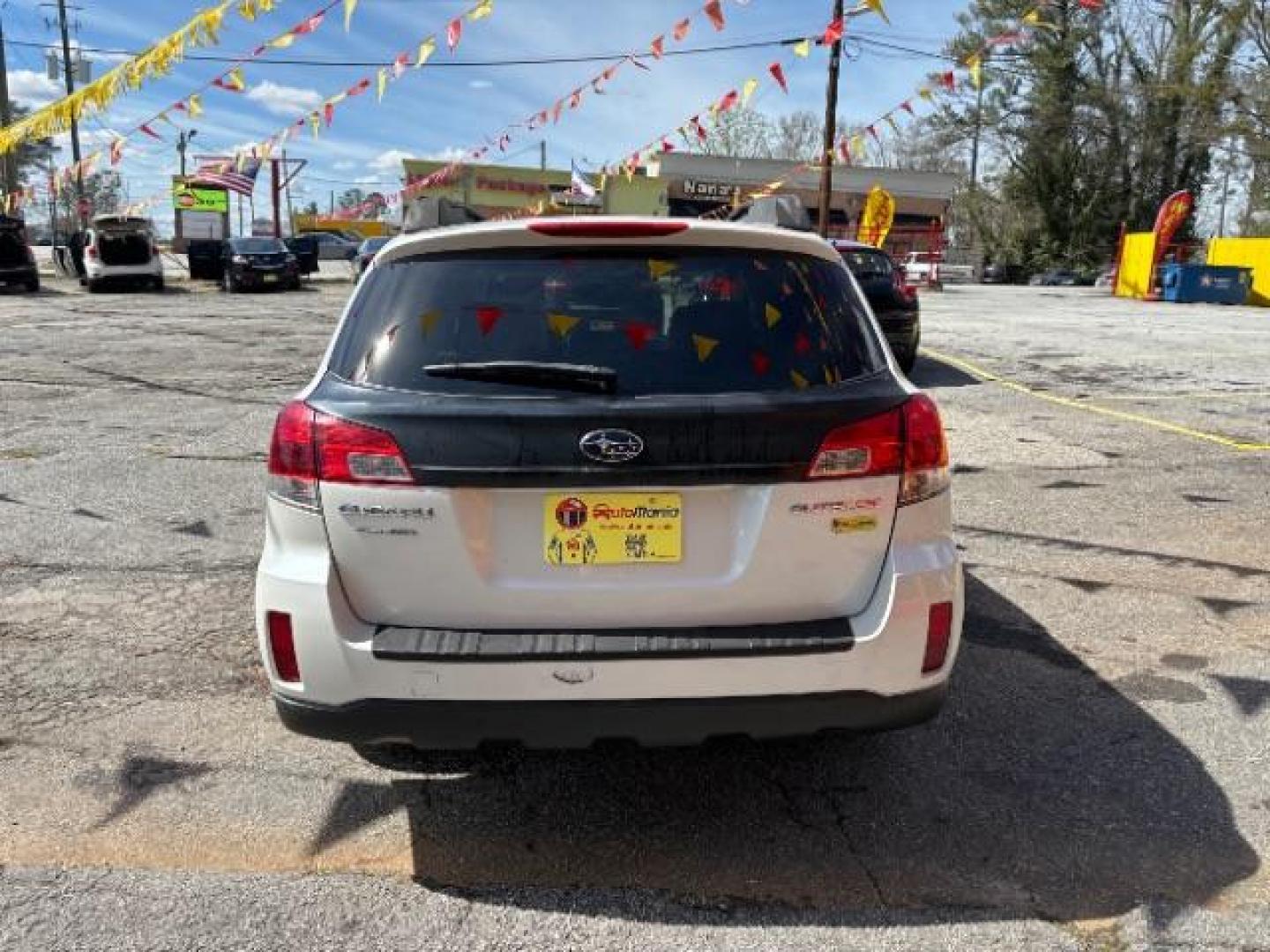 2010 White Subaru Outback 2.5i Limited (4S4BRCKC0A3) with an 2.5L H4 DOHC 16V engine, Continuously Variable Transmission transmission, located at 1806 Veterans Memorial Hwy SW, Austell, GA, 30168, (770) 944-9558, 33.817959, -84.606987 - Photo#4