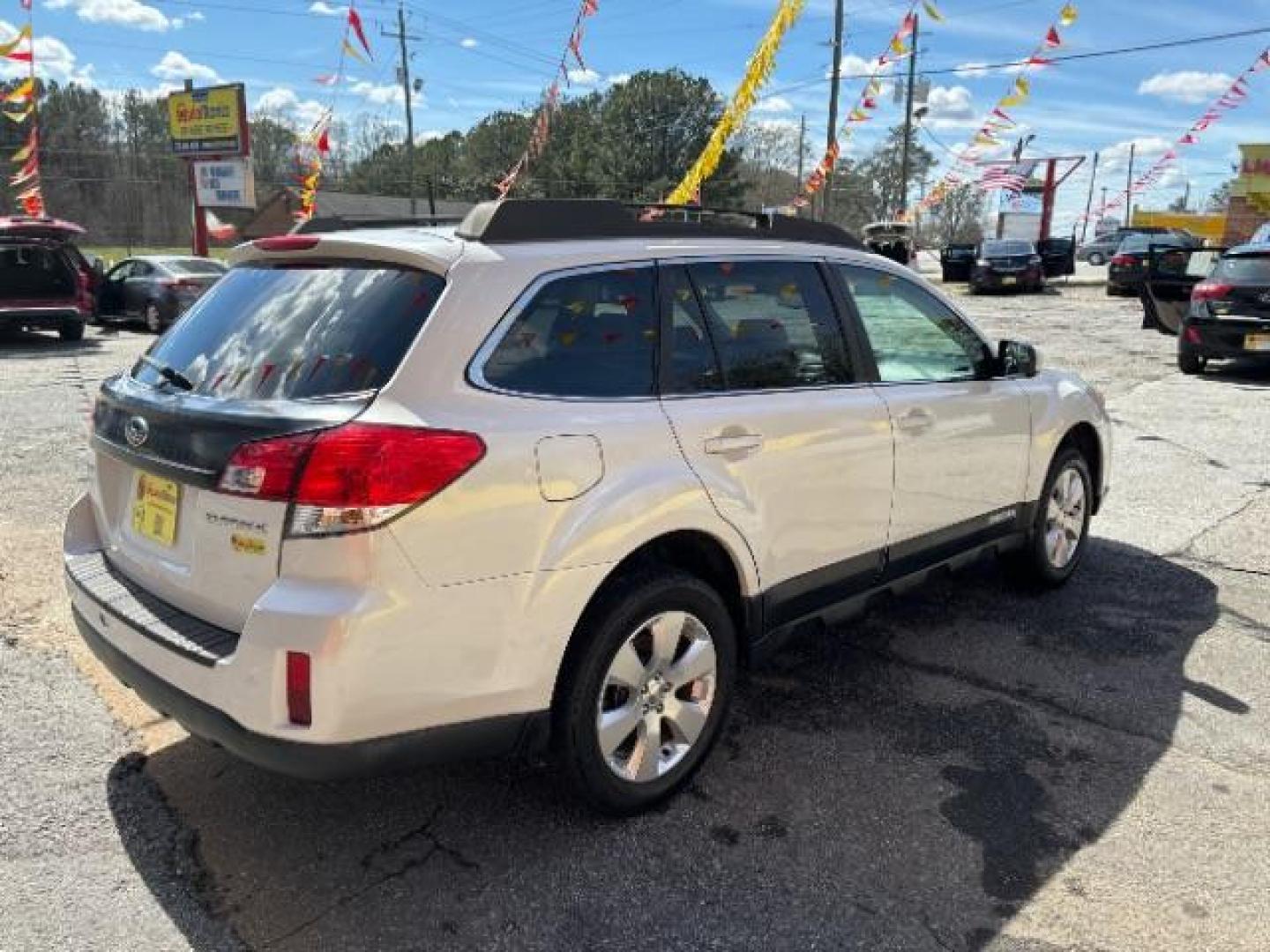 2010 White Subaru Outback 2.5i Limited (4S4BRCKC0A3) with an 2.5L H4 DOHC 16V engine, Continuously Variable Transmission transmission, located at 1806 Veterans Memorial Hwy SW, Austell, GA, 30168, (770) 944-9558, 33.817959, -84.606987 - Photo#6