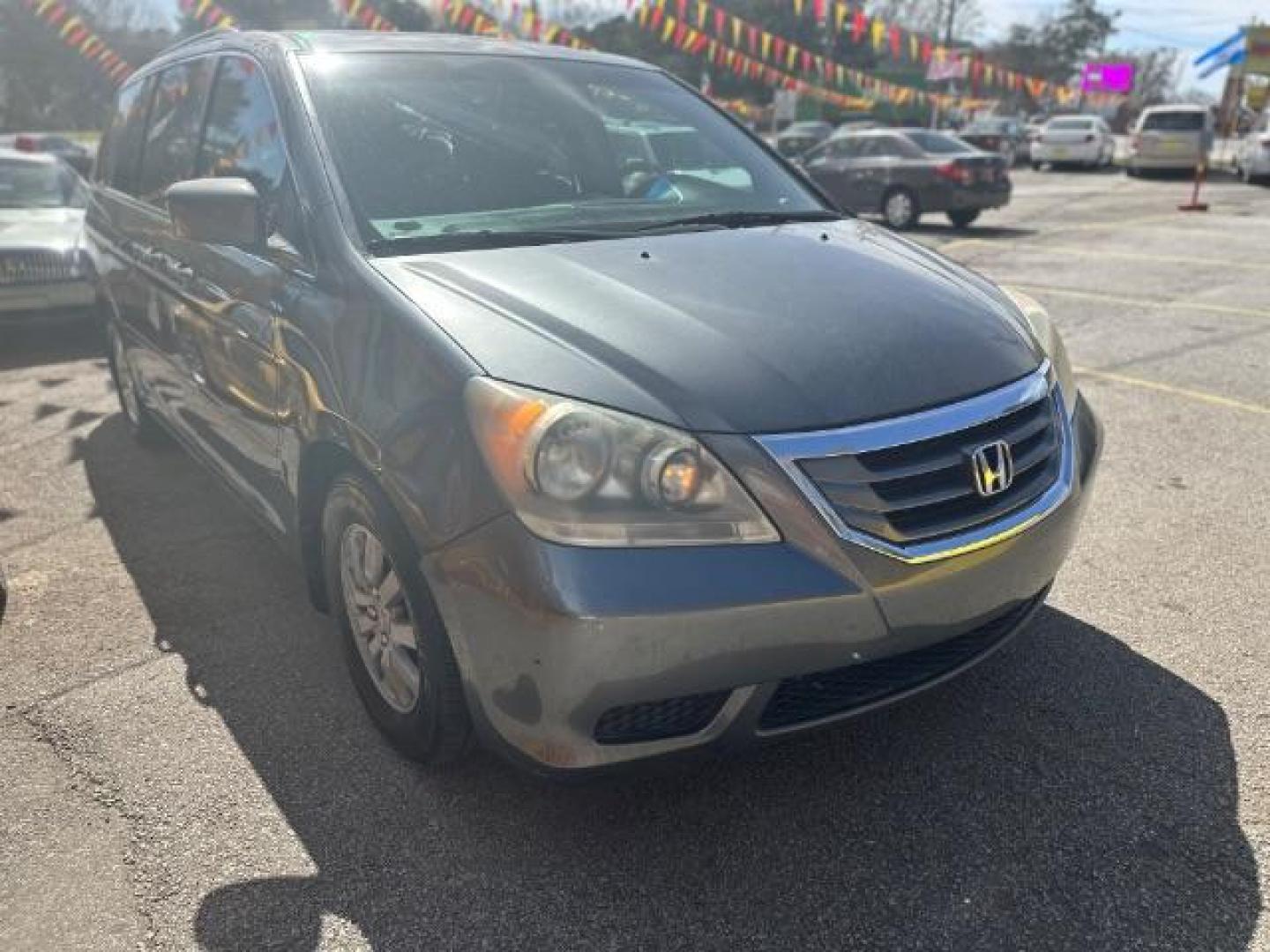 2010 Gray Honda Odyssey EX-L w/ DVD (5FNRL3H78AB) with an 3.5L V6 SOHC 24V engine, 5-Speed Automatic transmission, located at 1806 Veterans Memorial Hwy SW, Austell, GA, 30168, (770) 944-9558, 33.817959, -84.606987 - Photo#2