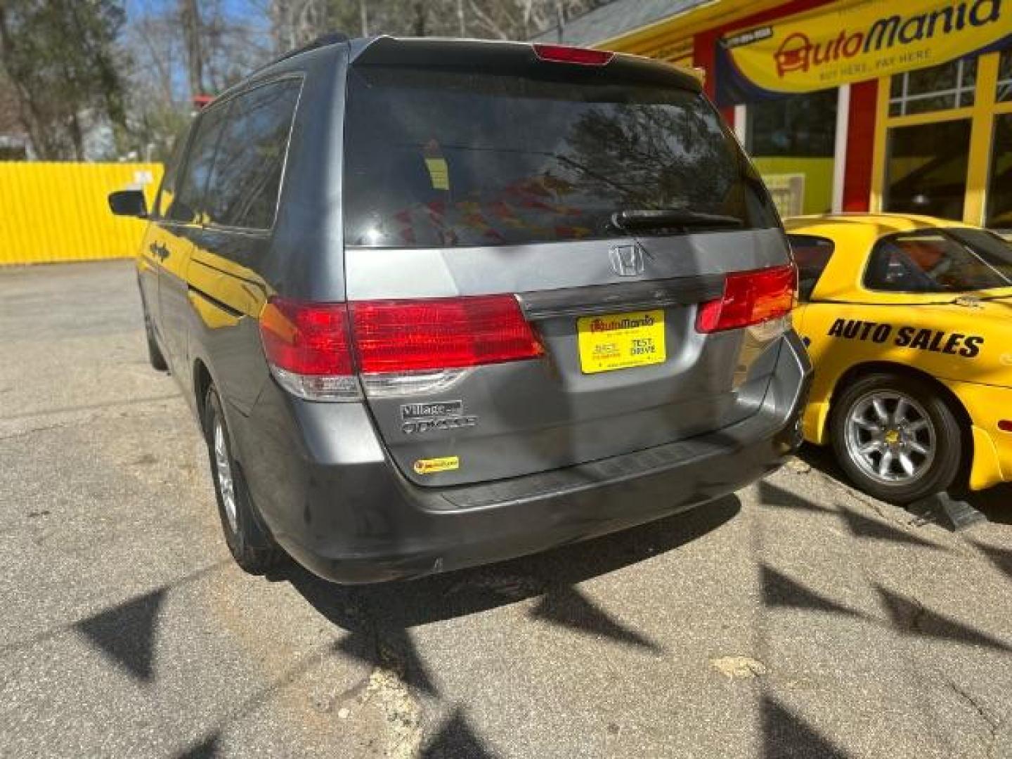 2010 Gray Honda Odyssey EX-L w/ DVD (5FNRL3H78AB) with an 3.5L V6 SOHC 24V engine, 5-Speed Automatic transmission, located at 1806 Veterans Memorial Hwy SW, Austell, GA, 30168, (770) 944-9558, 33.817959, -84.606987 - Photo#5