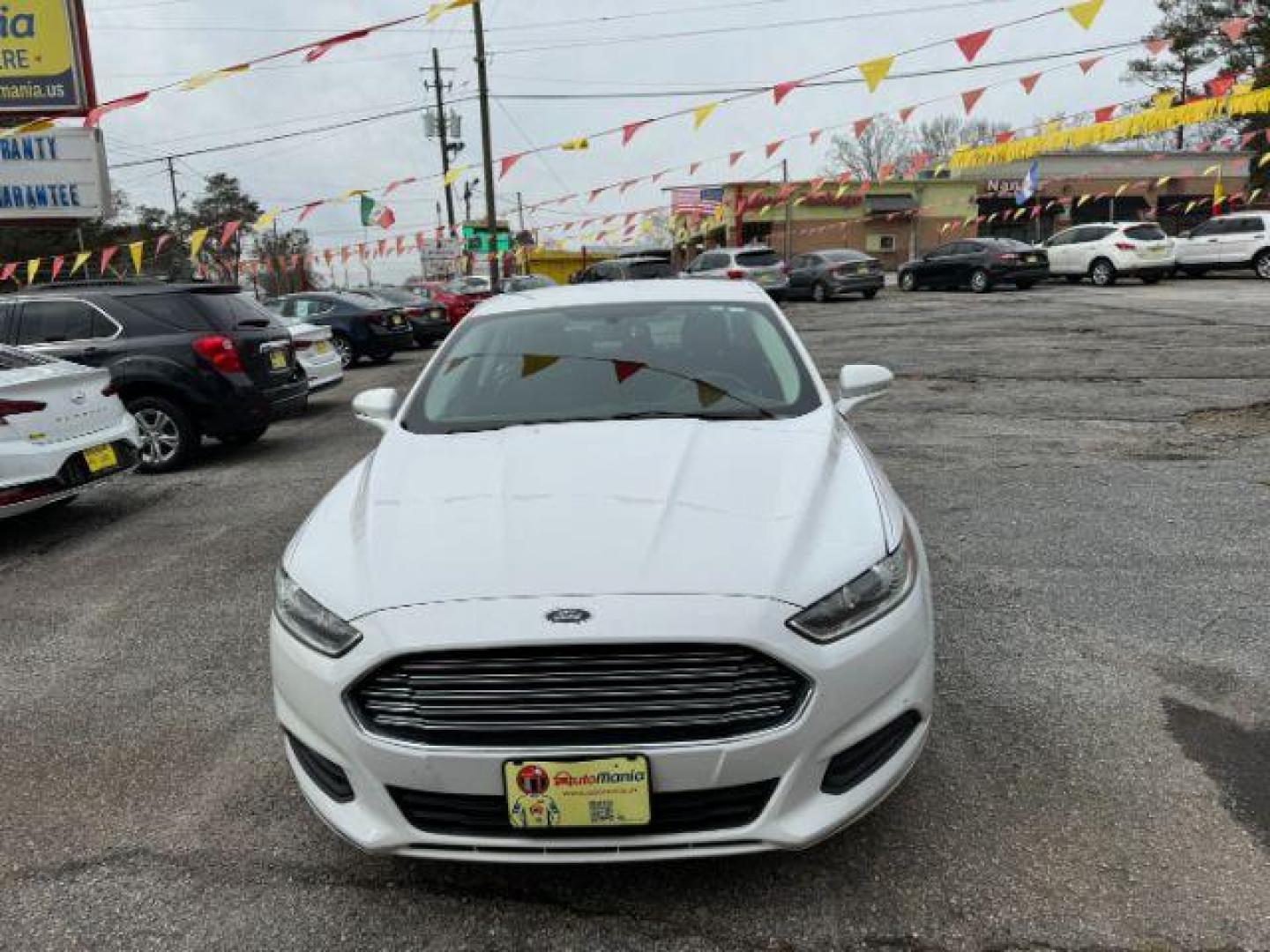 2016 White Ford Fusion SE (3FA6P0H72GR) with an 2.5L L4 DOHC 16V engine, 6-Speed Automatic transmission, located at 1806 Veterans Memorial Hwy SW, Austell, GA, 30168, (770) 944-9558, 33.817959, -84.606987 - Photo#1