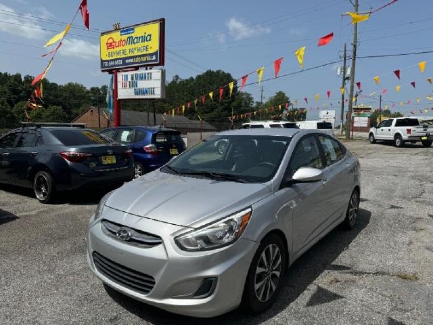 2017 Gray Hyundai Accent SE 4-Door 6A (KMHCT4AE4HU) with an 1.6L L4 DOHC 16V engine, 6-Speed Automatic transmission, located at 1806 Veterans Memorial Hwy SW, Austell, GA, 30168, (770) 944-9558, 33.817959, -84.606987 - Photo#0