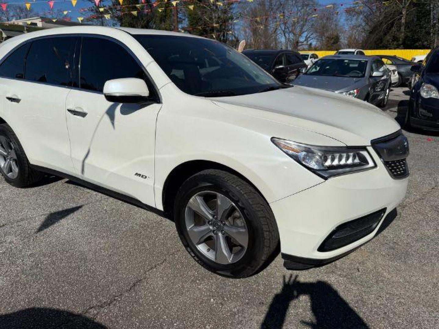 2014 White Acura MDX 6-Spd AT (5FRYD3H22EB) with an 3.5L V6 SOHC 24V engine, 6-Speed Automatic transmission, located at 1806 Veterans Memorial Hwy SW, Austell, GA, 30168, (770) 944-9558, 33.817959, -84.606987 - Photo#9