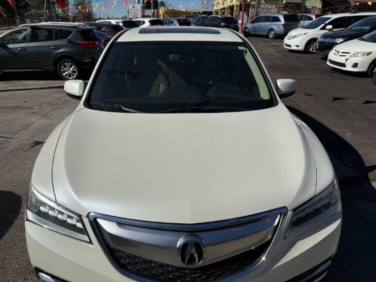 2014 White Acura MDX 6-Spd AT (5FRYD3H22EB) with an 3.5L V6 SOHC 24V engine, 6-Speed Automatic transmission, located at 1806 Veterans Memorial Hwy SW, Austell, GA, 30168, (770) 944-9558, 33.817959, -84.606987 - Photo#11