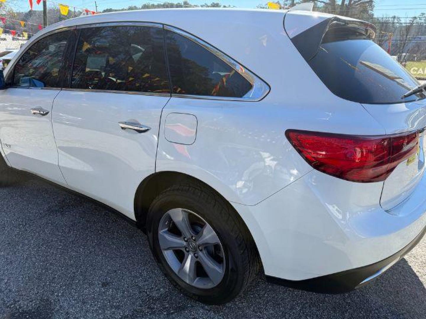 2014 White Acura MDX 6-Spd AT (5FRYD3H22EB) with an 3.5L V6 SOHC 24V engine, 6-Speed Automatic transmission, located at 1806 Veterans Memorial Hwy SW, Austell, GA, 30168, (770) 944-9558, 33.817959, -84.606987 - Photo#2