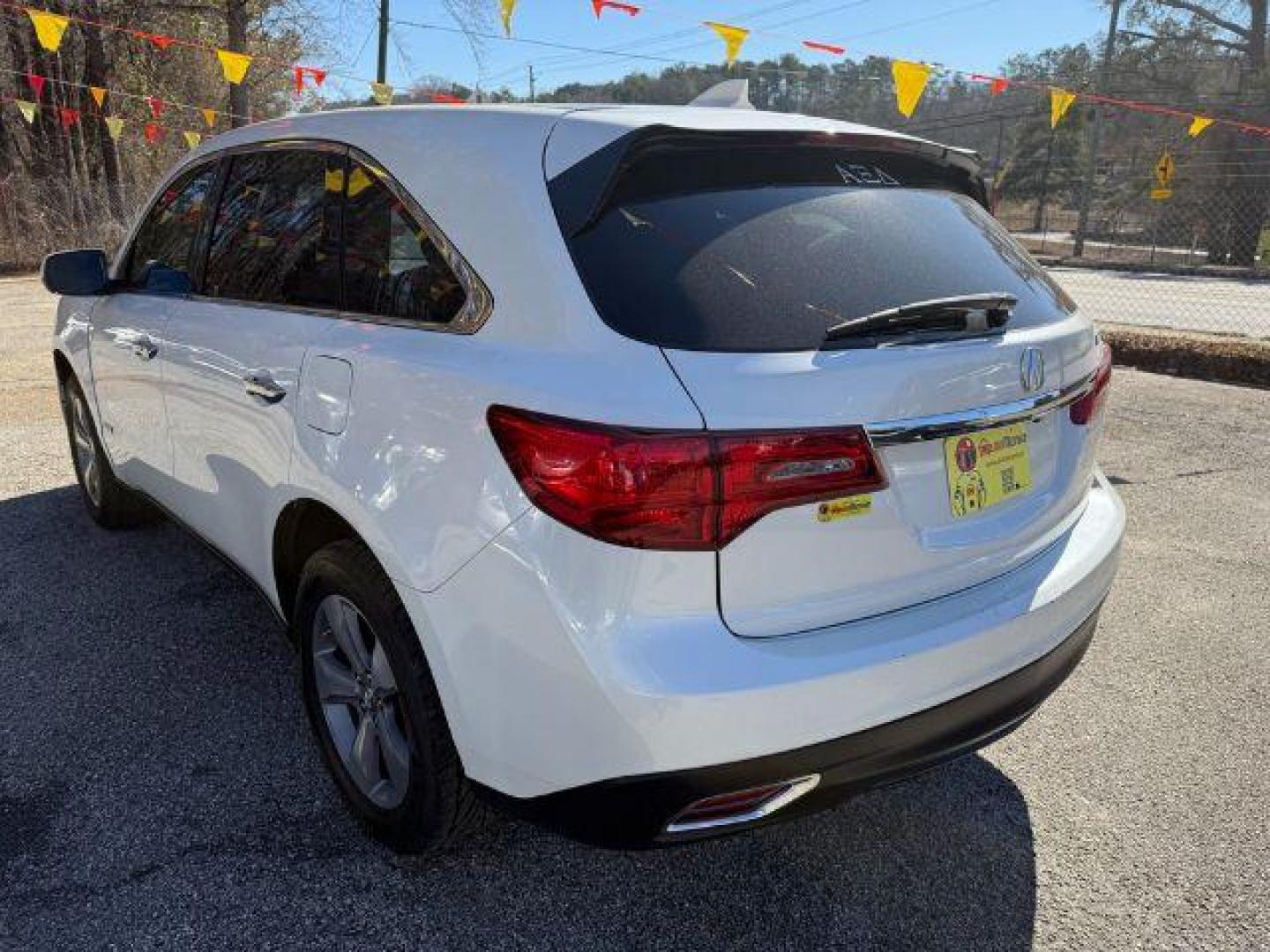 2014 White Acura MDX 6-Spd AT (5FRYD3H22EB) with an 3.5L V6 SOHC 24V engine, 6-Speed Automatic transmission, located at 1806 Veterans Memorial Hwy SW, Austell, GA, 30168, (770) 944-9558, 33.817959, -84.606987 - Photo#3