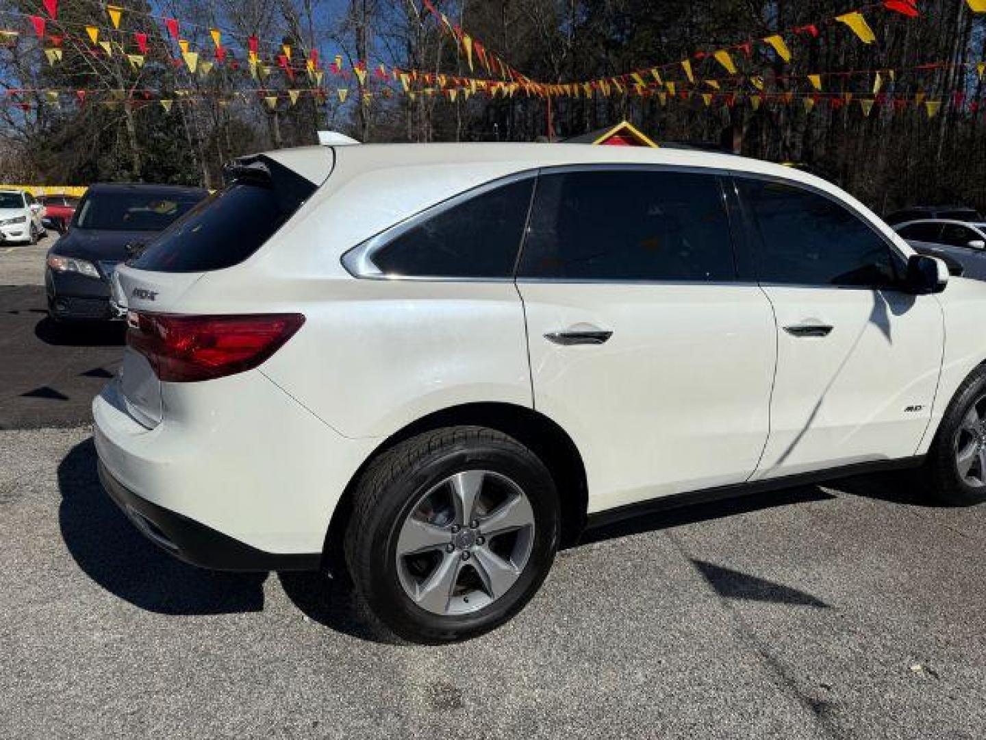 2014 White Acura MDX 6-Spd AT (5FRYD3H22EB) with an 3.5L V6 SOHC 24V engine, 6-Speed Automatic transmission, located at 1806 Veterans Memorial Hwy SW, Austell, GA, 30168, (770) 944-9558, 33.817959, -84.606987 - Photo#7