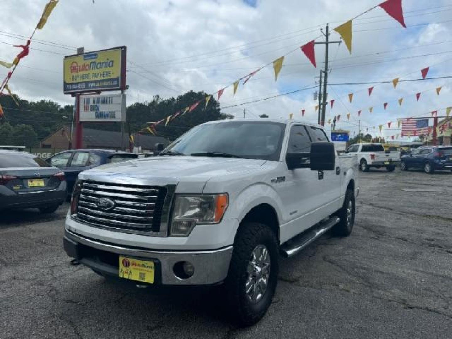 2011 White Ford F-150 XLT SuperCrew 5.5-ft (1FTFW1ET1BF) with an 3.5L V6 TURBO engine, 6-Speed Automatic transmission, located at 1806 Veterans Memorial Hwy SW, Austell, GA, 30168, (770) 944-9558, 33.817959, -84.606987 - Photo#0