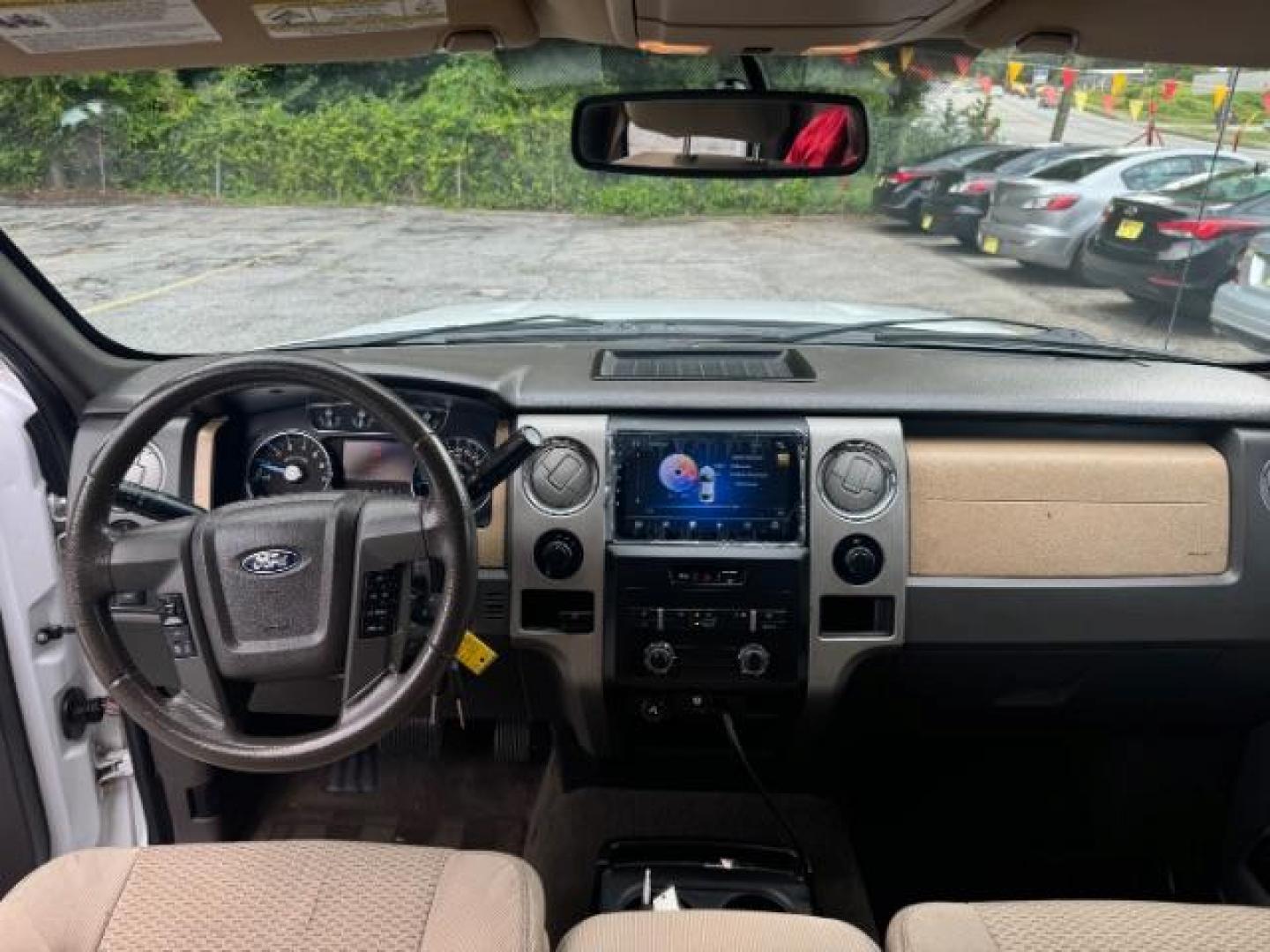 2011 White Ford F-150 XLT SuperCrew 5.5-ft (1FTFW1ET1BF) with an 3.5L V6 TURBO engine, 6-Speed Automatic transmission, located at 1806 Veterans Memorial Hwy SW, Austell, GA, 30168, (770) 944-9558, 33.817959, -84.606987 - Photo#10