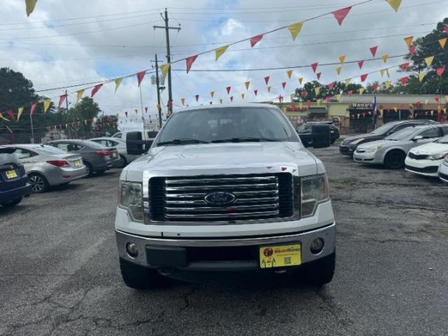 2011 White Ford F-150 XLT SuperCrew 5.5-ft (1FTFW1ET1BF) with an 3.5L V6 TURBO engine, 6-Speed Automatic transmission, located at 1806 Veterans Memorial Hwy SW, Austell, GA, 30168, (770) 944-9558, 33.817959, -84.606987 - Photo#1