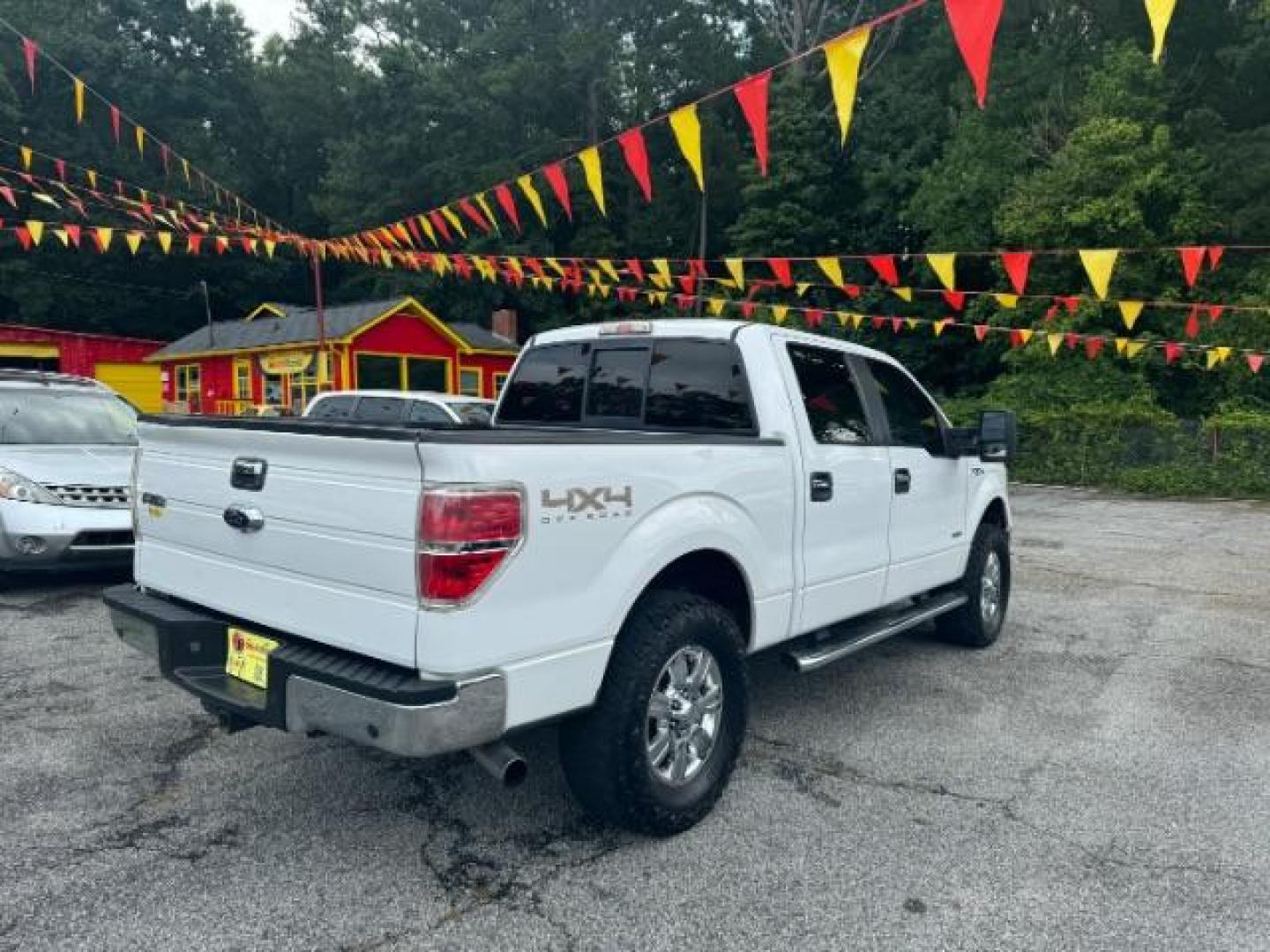 2011 White Ford F-150 XLT SuperCrew 5.5-ft (1FTFW1ET1BF) with an 3.5L V6 TURBO engine, 6-Speed Automatic transmission, located at 1806 Veterans Memorial Hwy SW, Austell, GA, 30168, (770) 944-9558, 33.817959, -84.606987 - Photo#3