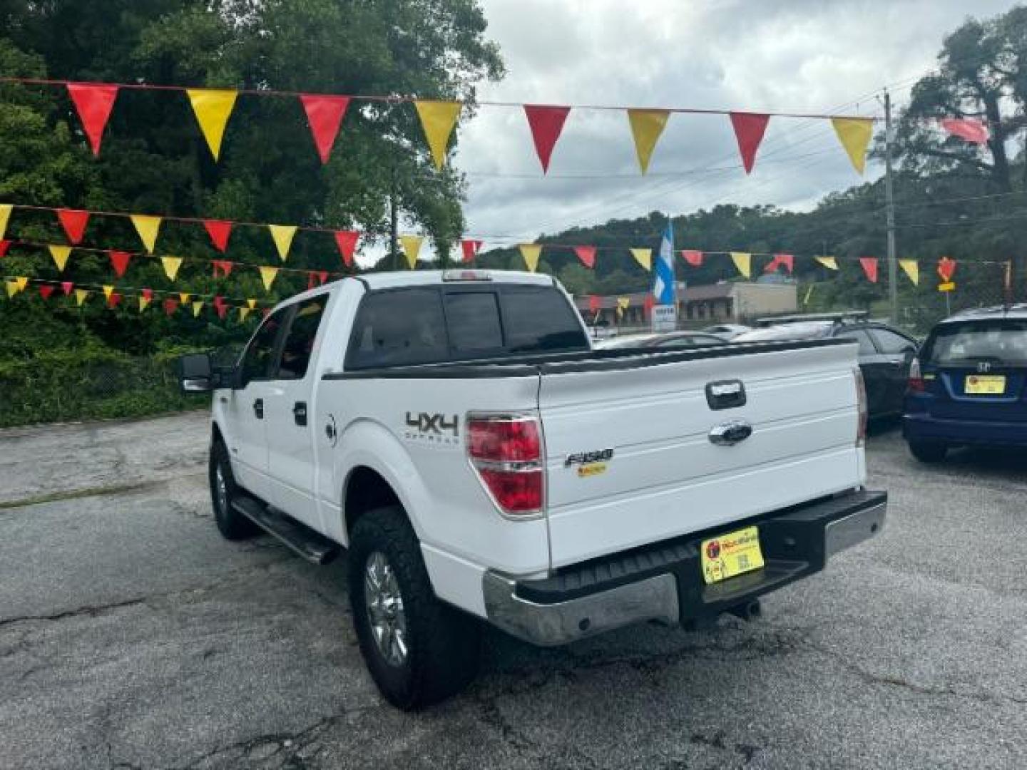 2011 White Ford F-150 XLT SuperCrew 5.5-ft (1FTFW1ET1BF) with an 3.5L V6 TURBO engine, 6-Speed Automatic transmission, located at 1806 Veterans Memorial Hwy SW, Austell, GA, 30168, (770) 944-9558, 33.817959, -84.606987 - Photo#5