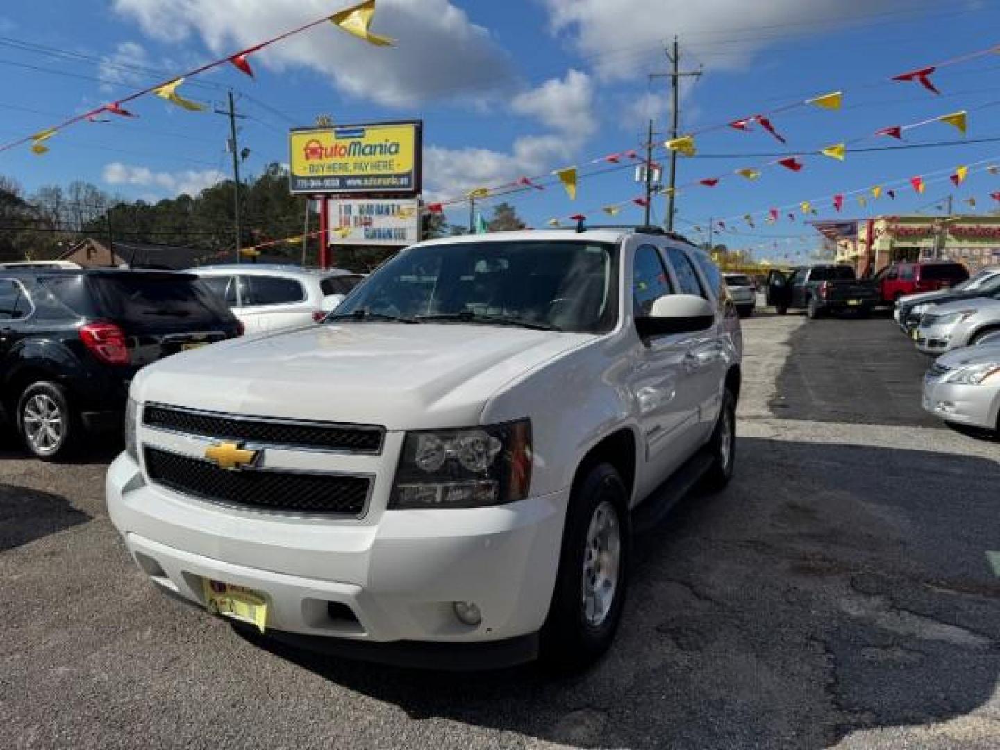 2013 White Chevrolet Tahoe LT 2WD (1GNSCBE00DR) with an 5.3L V8 OHV 16V FFV engine, 6-Speed Automatic transmission, located at 1806 Veterans Memorial Hwy SW, Austell, GA, 30168, (770) 944-9558, 33.817959, -84.606987 - Photo#0