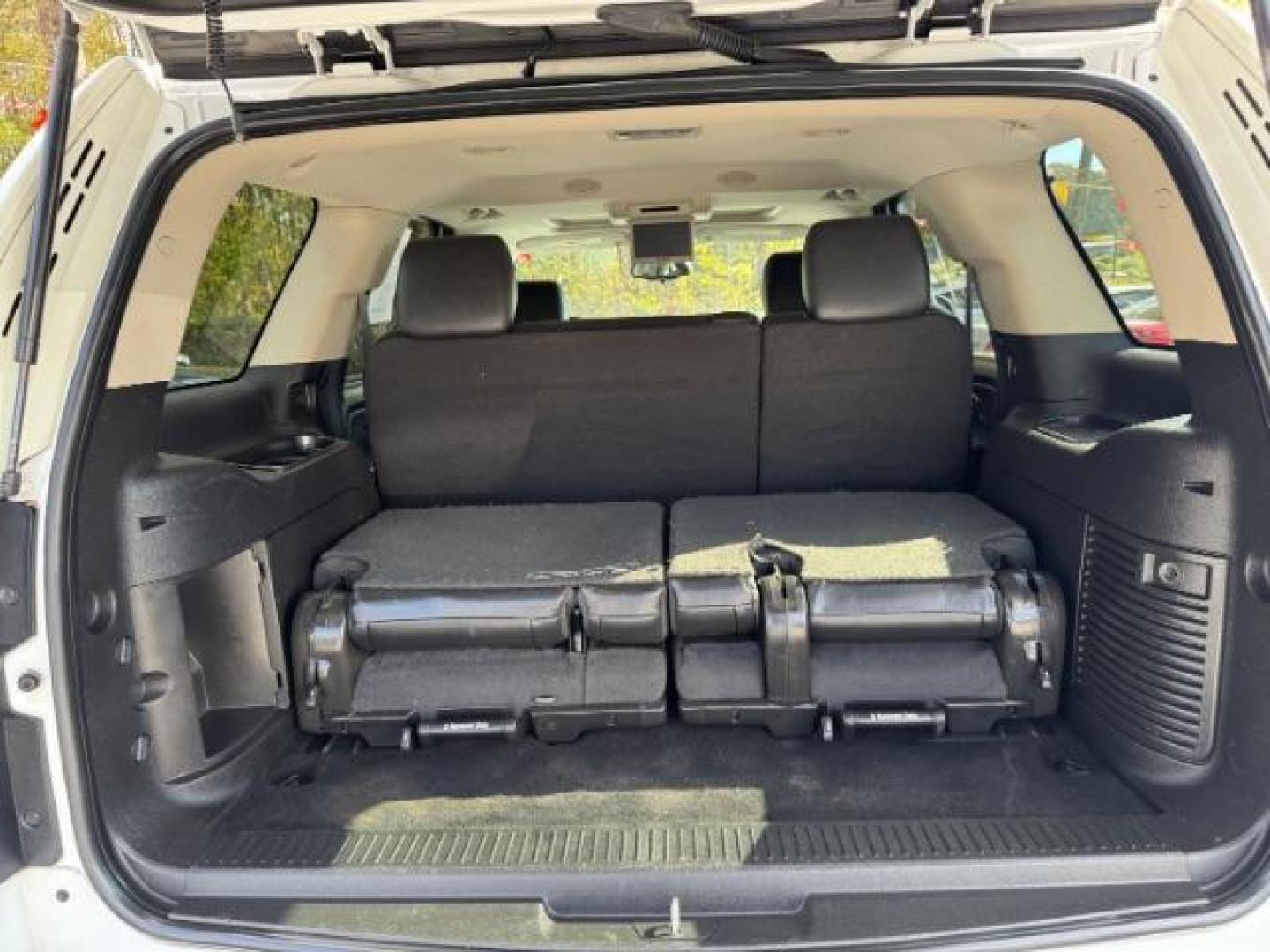 2013 White Chevrolet Tahoe LT 2WD (1GNSCBE00DR) with an 5.3L V8 OHV 16V FFV engine, 6-Speed Automatic transmission, located at 1806 Veterans Memorial Hwy SW, Austell, GA, 30168, (770) 944-9558, 33.817959, -84.606987 - Photo#17