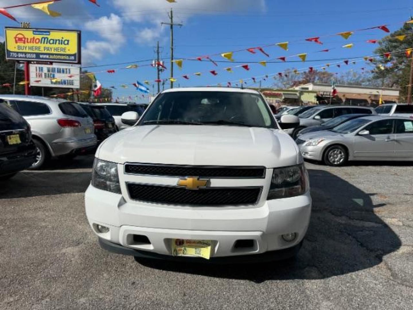 2013 White Chevrolet Tahoe LT 2WD (1GNSCBE00DR) with an 5.3L V8 OHV 16V FFV engine, 6-Speed Automatic transmission, located at 1806 Veterans Memorial Hwy SW, Austell, GA, 30168, (770) 944-9558, 33.817959, -84.606987 - Photo#1