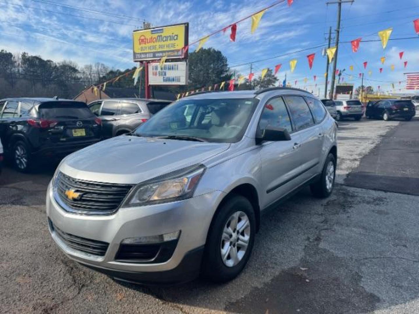 2015 Silver Chevrolet Traverse LS FWD w/PDC (1GNKRFED0FJ) with an 3.6L V6 DOHC 24V engine, 6-Speed Automatic transmission, located at 1806 Veterans Memorial Hwy SW, Austell, GA, 30168, (770) 944-9558, 33.817959, -84.606987 - Photo#0